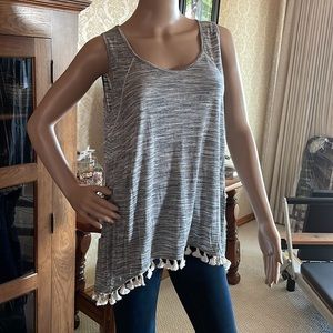 Relished tank with cream tassels at hem